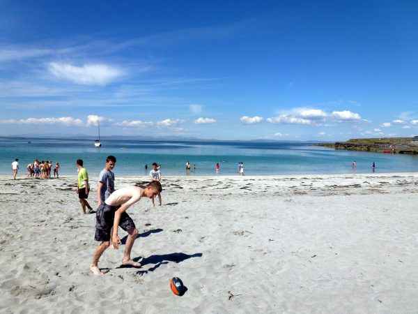 Students playing football at Colaiste O Direain Aran Islands Galway